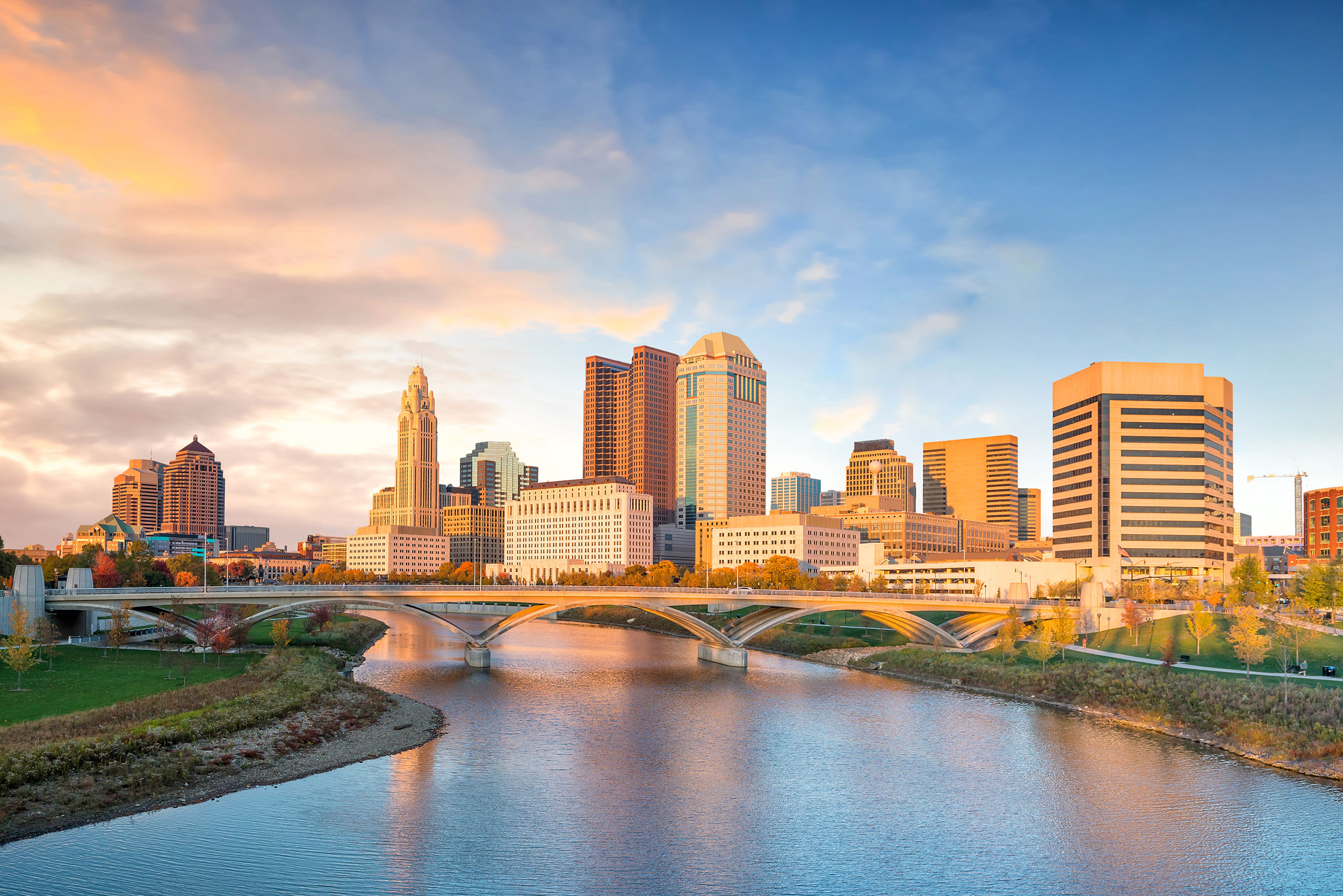 View of downtown Columbus Ohio skyline at sunset.