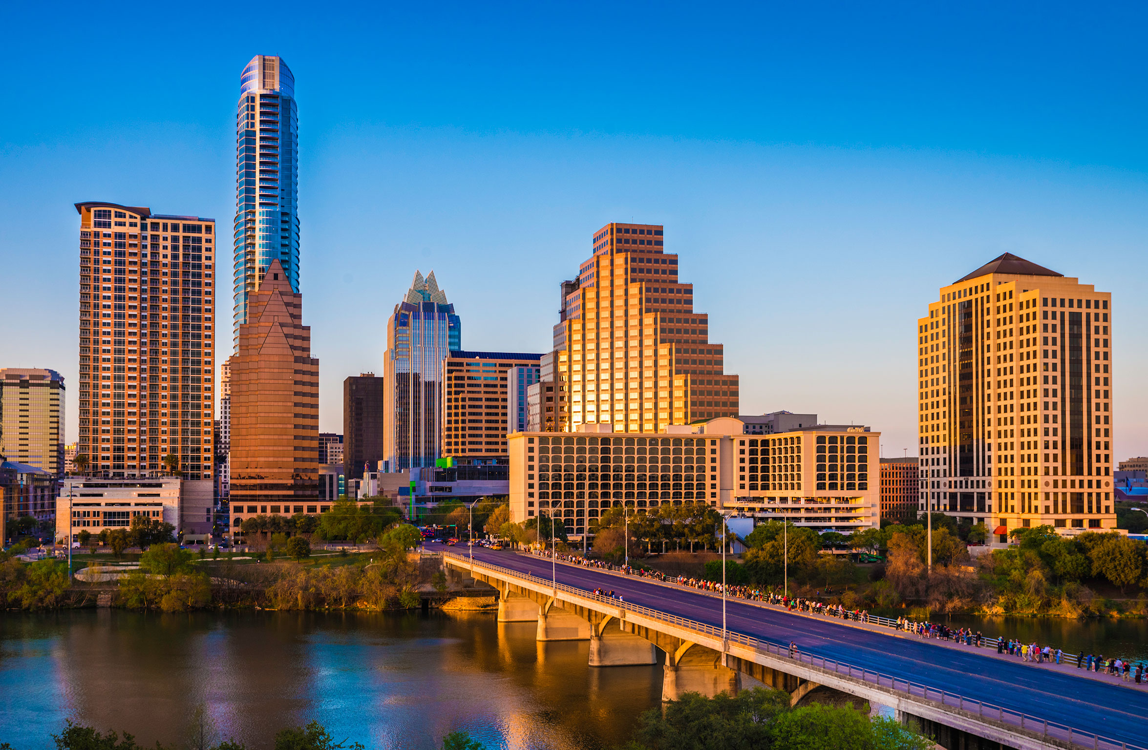 Austin Texas cityscape skyline panorama, Congress Avenue Bridge in late afternoon.